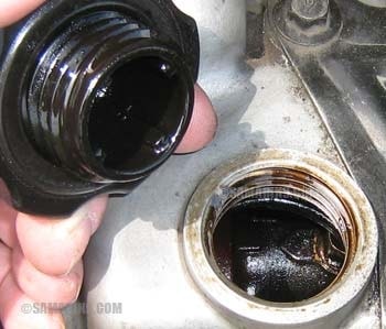 check under the oil cap - Cyrus Auto Parts
